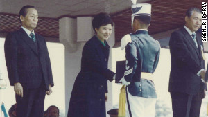 Park Geun-hye, now a South Korean presidential candidate, shakes hands with graduates of Air Force Academy in 1979.
